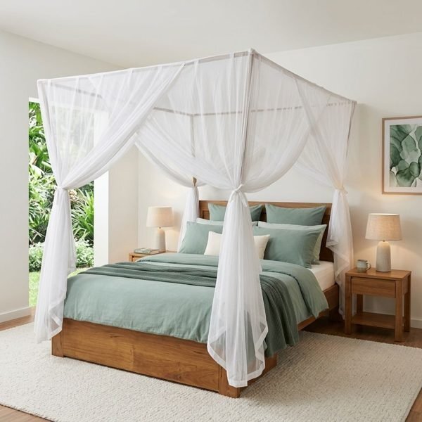 Canopy bed curtains draped straight over the rails of a four poster bed, gathered at the corners